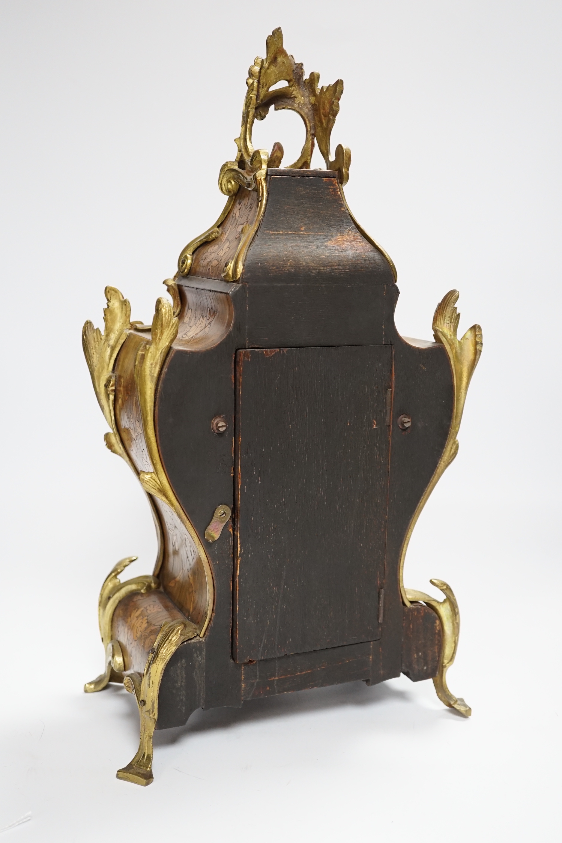 A French gilt metal mounted rosewood mantel clock. 40cm
